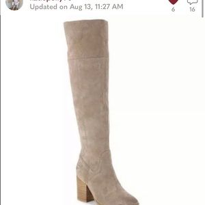 Adorable tall taupe tall boots.
